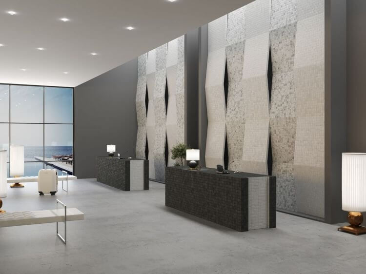 Modern interior showcasing Ecostone Penta Onice Matte mosaics on walls with elegant reception desks.