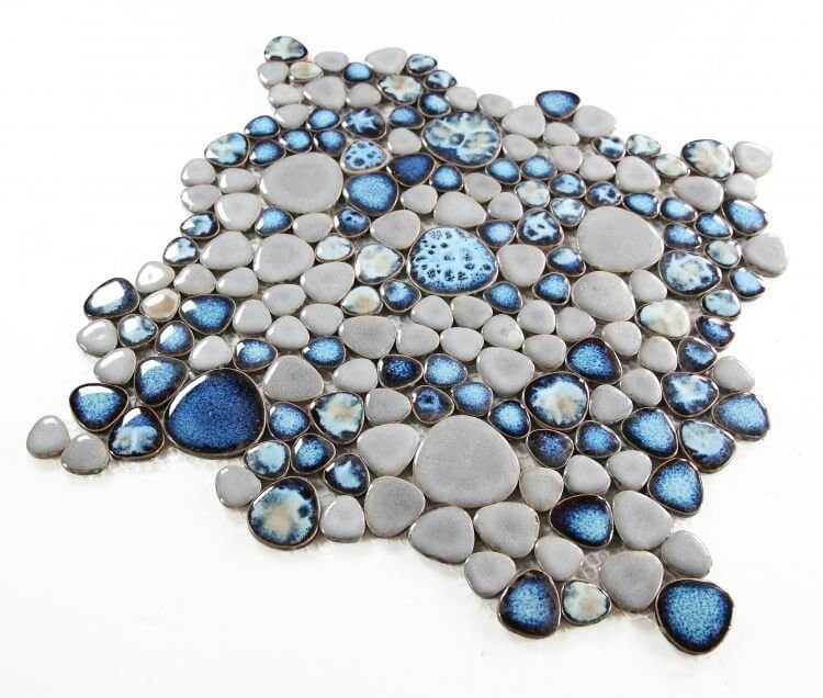 Poseidon Cielo 11.5x11.5 pebble mosaic tile showcasing soothing blue tones and varying textures.