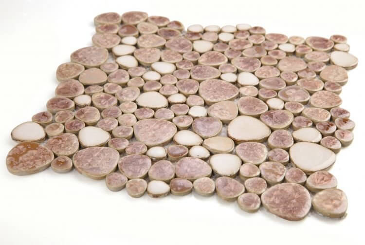 Close-up of Poseidon Earth 11.5 x 11.5 pebble mosaic tile featuring soft beiges and warm grays.