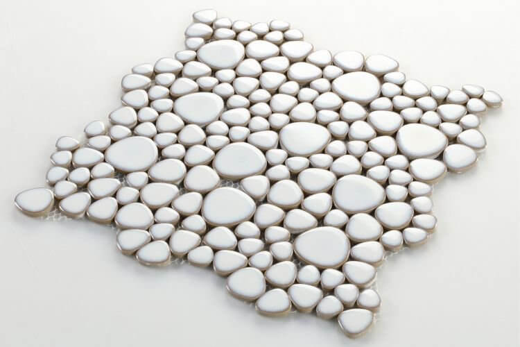 Poseidon Fancy White 11.5x11.5 pebble mosaic tile featuring smooth white pebbles for a refined design.