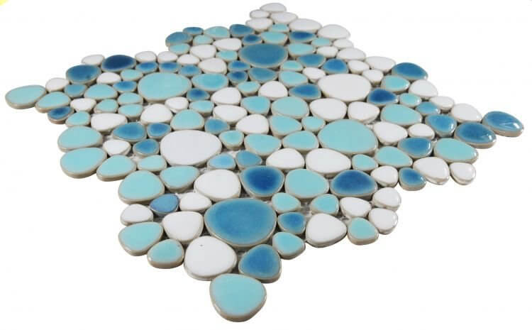 Teal and white pebble mosaic tile sheet in an artistic arrangement for pool and bathroom decor.