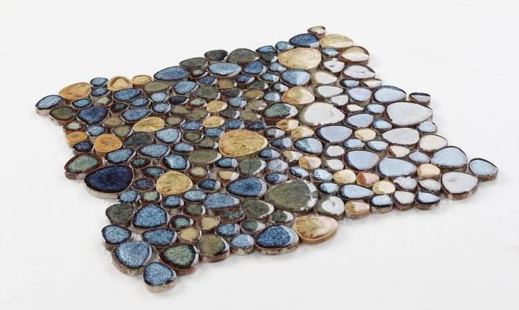 Poseidon Olive 11.50 x 11.50 pebble mosaic tile with blue, green, and natural tones. Ideal for pool areas.