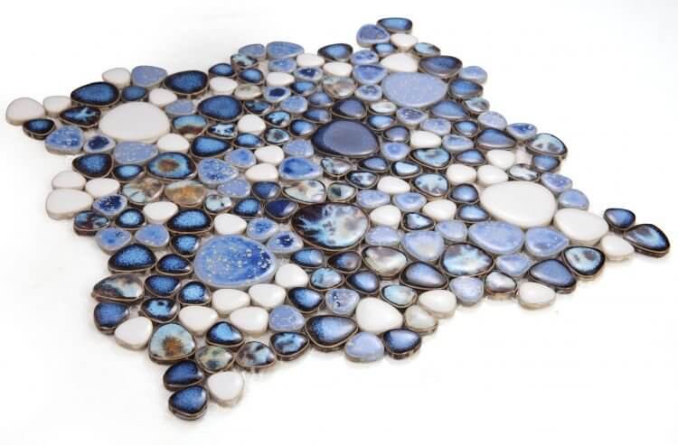 Poseidon Royal Blue 11.50x11.50 pebble mosaic tile featuring various shades of blue and white pebbles, ideal for modern aesthetics.