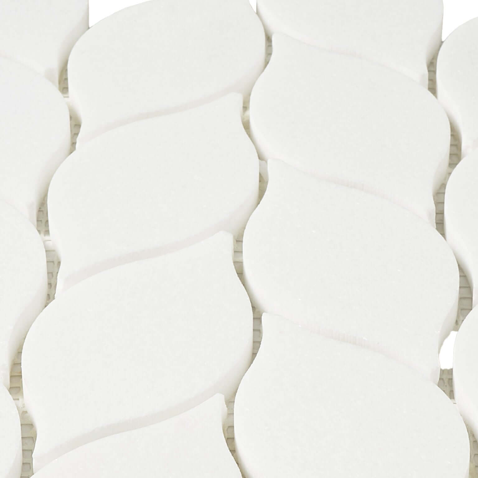 Thassos white leaf motif marble mosaic tile polished, featuring elegant curved shapes in pure white marble.